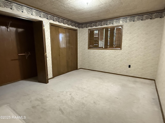 unfurnished bedroom with light carpet