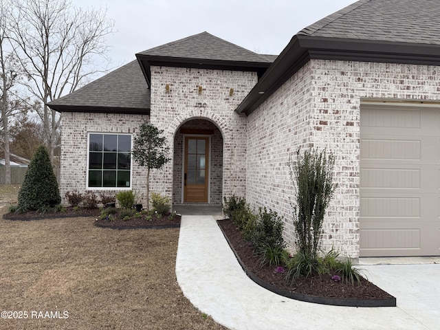 property entrance with a garage