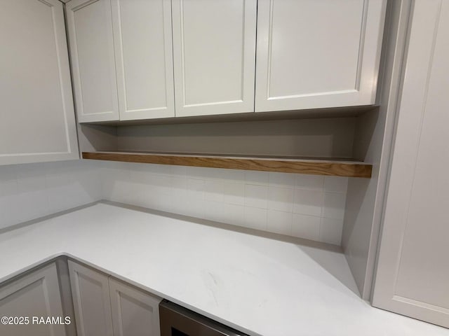 interior space featuring decorative backsplash