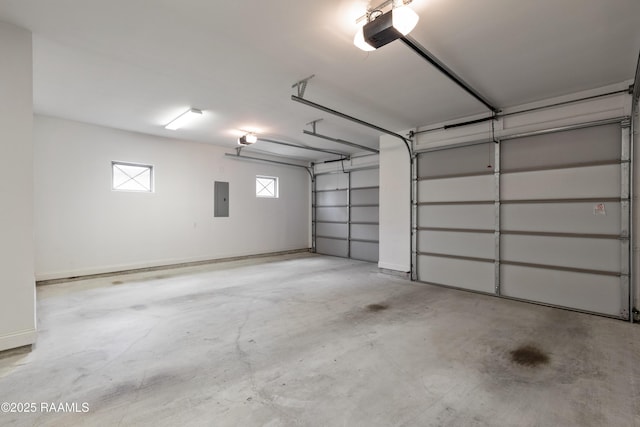 garage featuring a garage door opener and electric panel