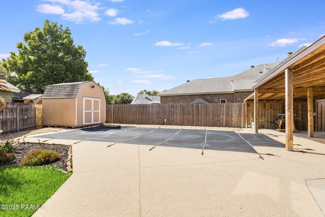 110 Yorkshire Cir, Lafayette, LA 70508 - view of parking / parking lot featuring a shed and a fenced backyard