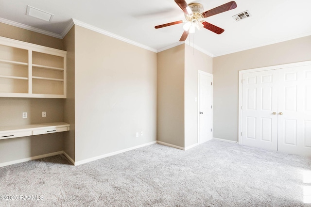 110 Yorkshire Cir, Lafayette, LA 70508 - unfurnished bedroom featuring light carpet, crown molding, baseboards, a ceiling fan, and a closet