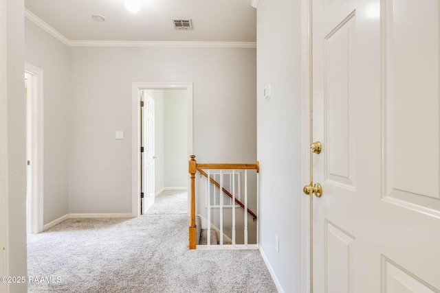 110 Yorkshire Cir, Lafayette, LA 70508 - hallway featuring an upstairs landing, carpet flooring, crown molding, and baseboards