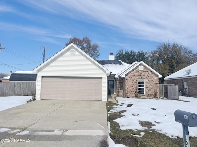 single story home with a garage