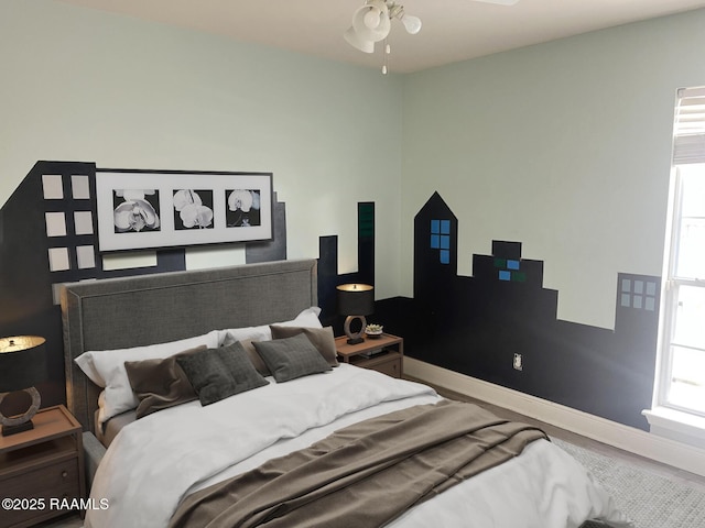 bedroom featuring wood-type flooring