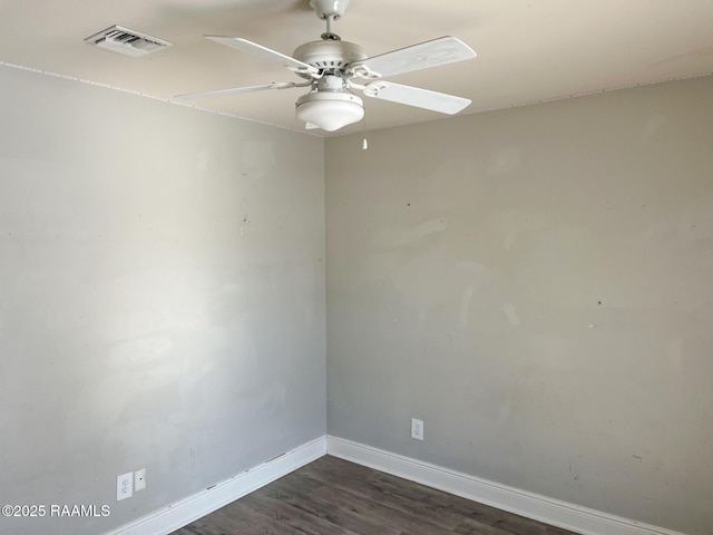 unfurnished room featuring dark hardwood / wood-style floors and ceiling fan