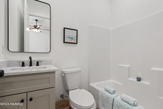 full bathroom featuring ceiling fan, vanity, toilet, and shower / bathing tub combination