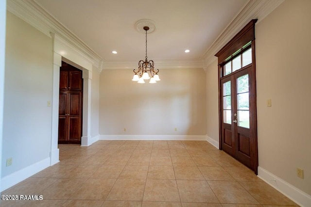 interior space featuring crown molding, light tile patterned flooring, an inviting chandelier, and french doors