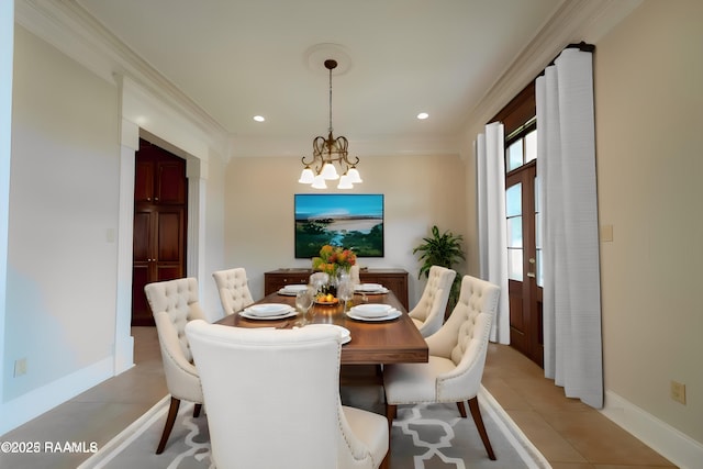 dining room featuring an inviting chandelier, light tile patterned floors, and crown molding