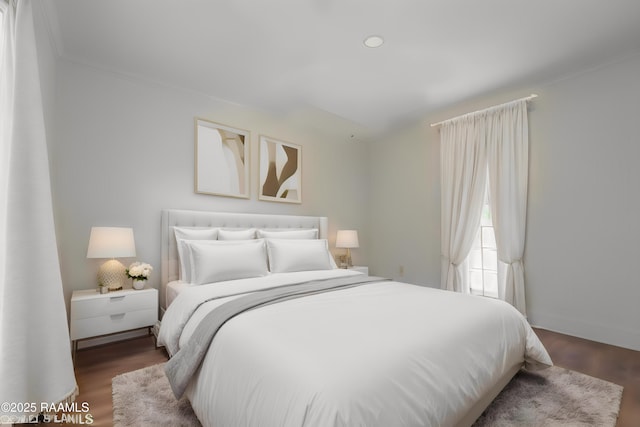 bedroom featuring dark hardwood / wood-style floors