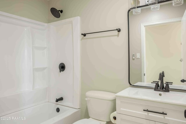 full bathroom with vanity, shower / washtub combination, and toilet