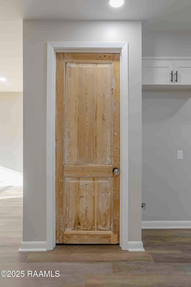 interior details featuring wood-type flooring