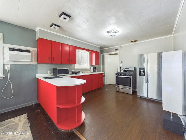 kitchen featuring stainless steel appliances, crown molding, dark wood-type flooring, and a wall mounted AC