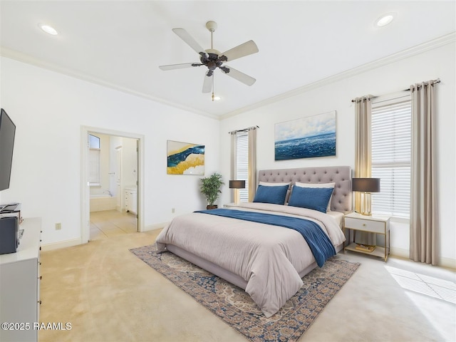 bedroom with ensuite bath, recessed lighting, crown molding, baseboards, and light colored carpet