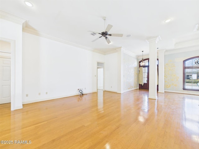 unfurnished living room featuring light wood-style flooring, a ceiling fan, crown molding, and ornate columns