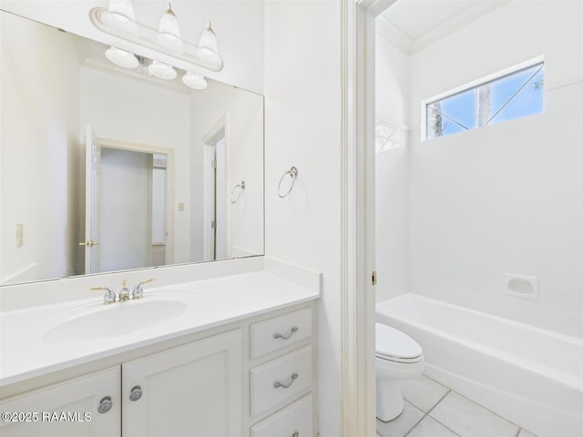 bathroom featuring vanity, tile patterned floors, and toilet