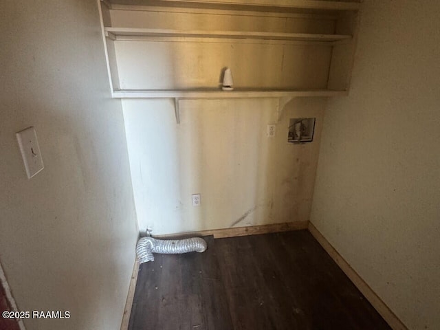 washroom with dark hardwood / wood-style floors and washer hookup