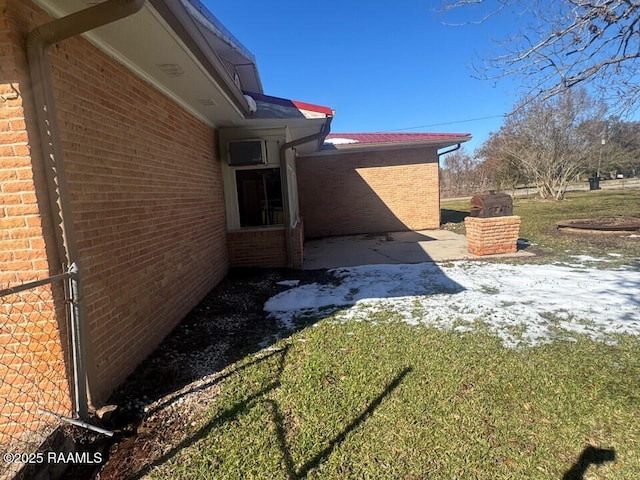 view of property exterior with a yard