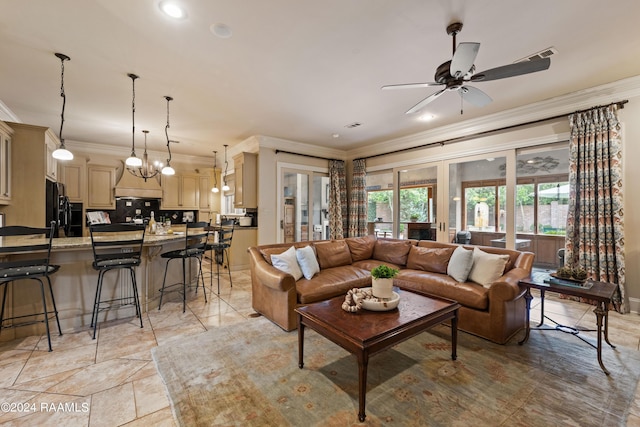 living room featuring crown molding and ceiling fan