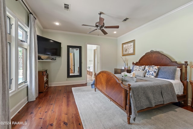 bedroom featuring dark hardwood / wood-style flooring, ornamental molding, and ceiling fan