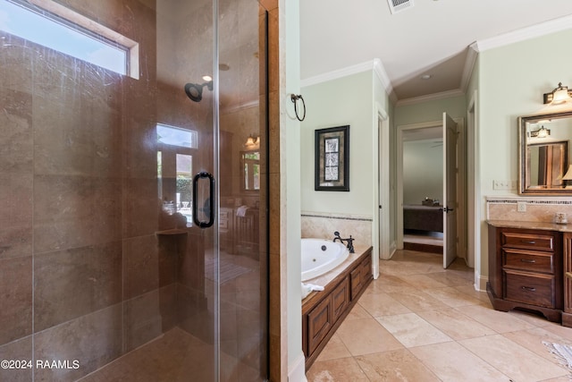 bathroom featuring tile patterned flooring, vanity, separate shower and tub, and ornamental molding