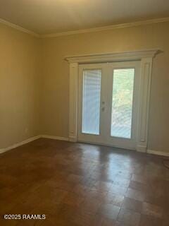 spare room featuring crown molding