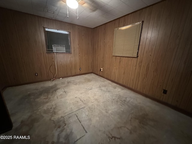 empty room with wood walls