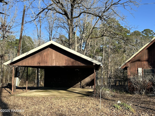 view of outbuilding featuring a carport