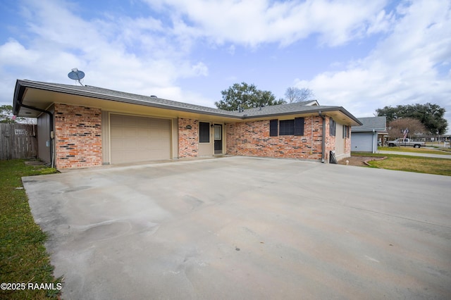 single story home featuring a garage