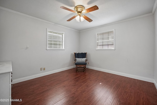 unfurnished room with crown molding, ceiling fan, a healthy amount of sunlight, and dark hardwood / wood-style flooring