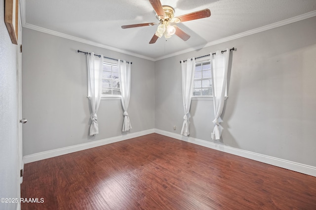 unfurnished room featuring crown molding, a healthy amount of sunlight, and wood-type flooring