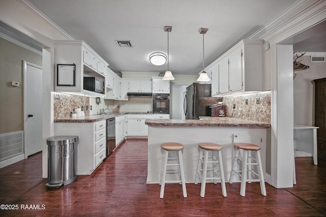 kitchen featuring crown molding, black appliances, dark hardwood / wood-style floors, and white cabinets