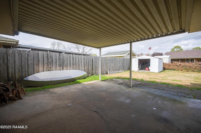 view of patio / terrace featuring a shed