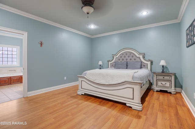 bedroom featuring crown molding and light hardwood / wood-style floors