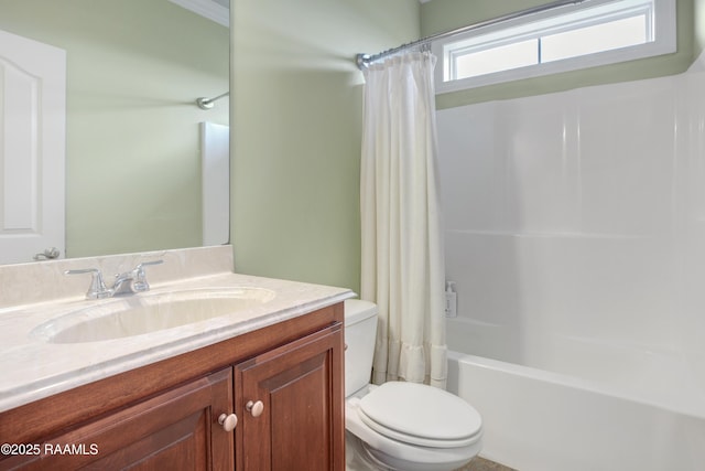 full bathroom featuring toilet, vanity, and shower / bathtub combination with curtain