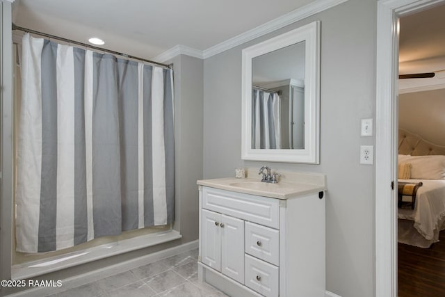 bathroom featuring crown molding, vanity, and a shower with shower curtain