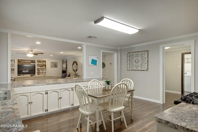 dining space featuring ornamental molding, dark hardwood / wood-style floors, and ceiling fan