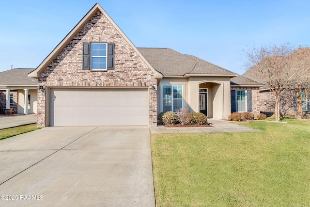 view of front of property featuring a garage and a front yard