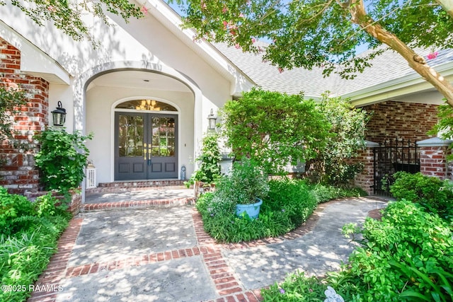 entrance to property featuring french doors