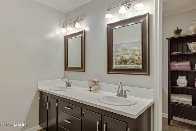 bathroom with crown molding and vanity