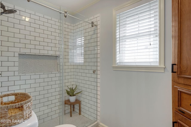 bathroom with an enclosed shower and toilet