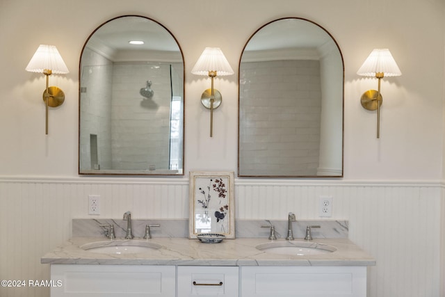 bathroom featuring vanity and a shower