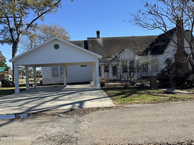 view of front of home with a playground