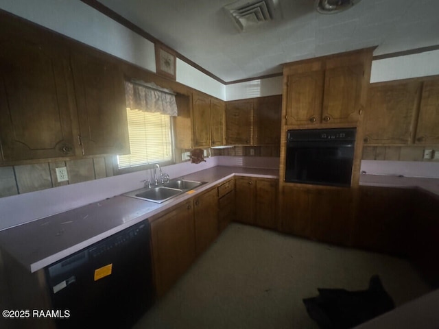 kitchen with sink and black appliances