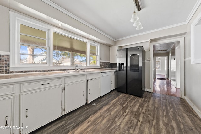 kitchen featuring sink, white cabinetry, crown molding, stainless steel fridge with ice dispenser, and white dishwasher