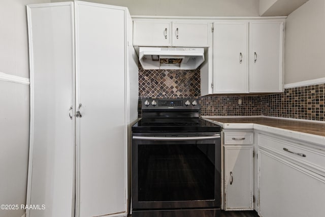 kitchen featuring white cabinetry, backsplash, and stainless steel electric range