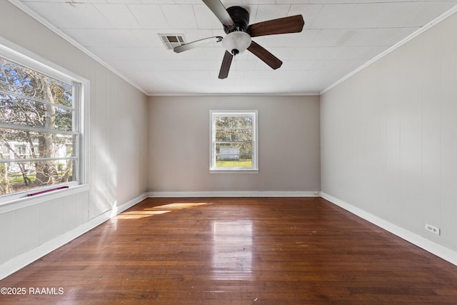 spare room featuring ornamental molding, ceiling fan, and dark hardwood / wood-style flooring