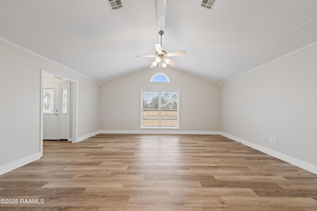 unfurnished room with vaulted ceiling, crown molding, ceiling fan, and light wood-type flooring