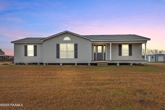 manufactured / mobile home with a yard