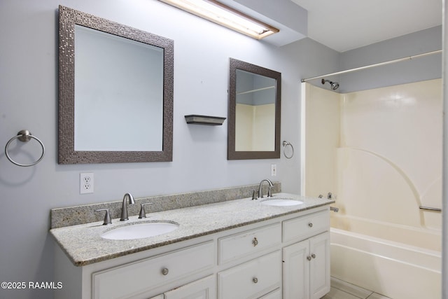 bathroom featuring vanity and bathtub / shower combination